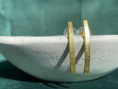 Slight Curved Bar Stud – handmade gold-plated brass earrings, nickel-free | Raavi Jewelry