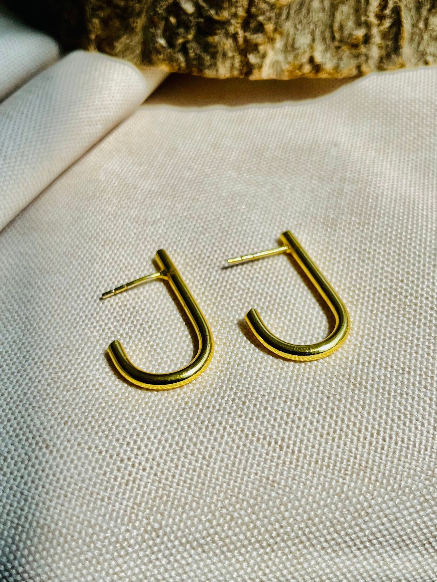 J-Shaped Brass Earrings – worn on model | Raavi Jewelry
