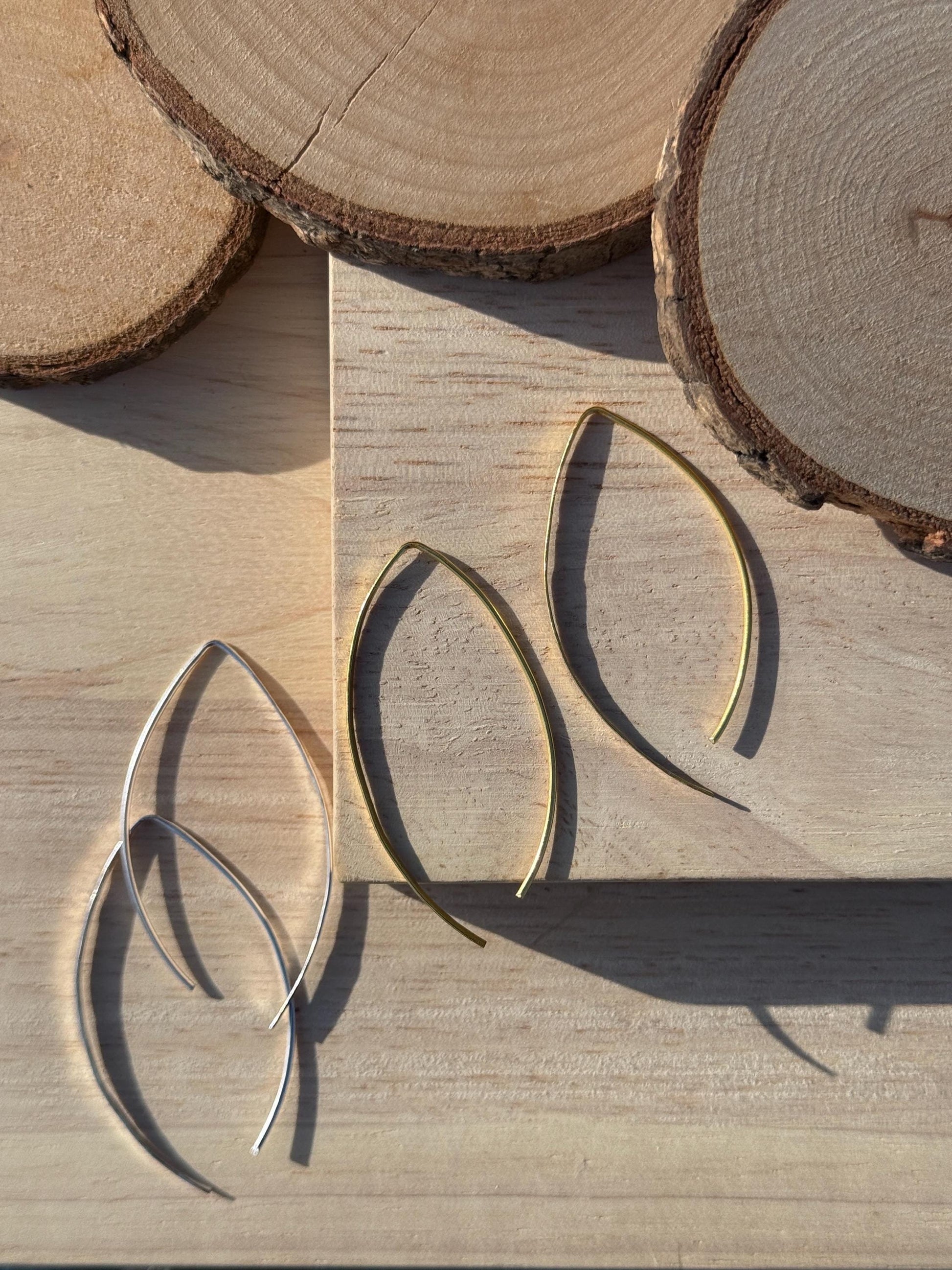 Curved Thread Earrings – worn on model | Raavi Jewelry