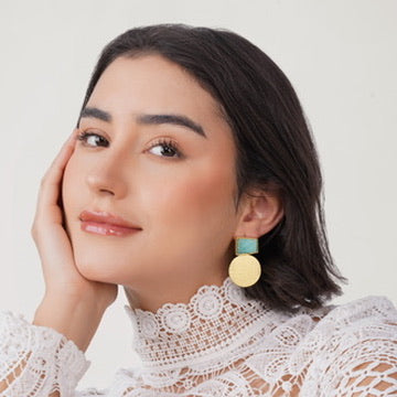 gold drop earring featuring a geometric Amazonite stone stud and a brushed matte gold circular disc.