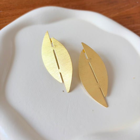 Sculptural folded-leaf earrings in brushed brass