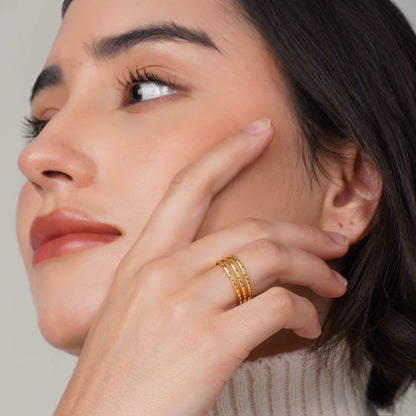 Hand-hammered triple-band brass ring